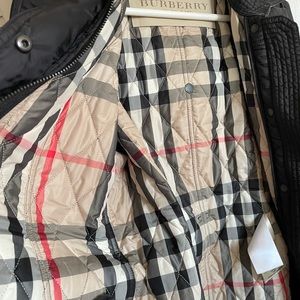 Woman’s Quilted Short Burberry Jacket with belt and detachable hood.